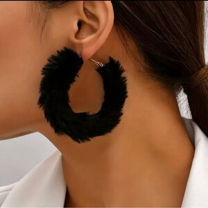 Furry black hoop earrings